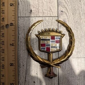 Cadillac Gold and Red Car Emblem